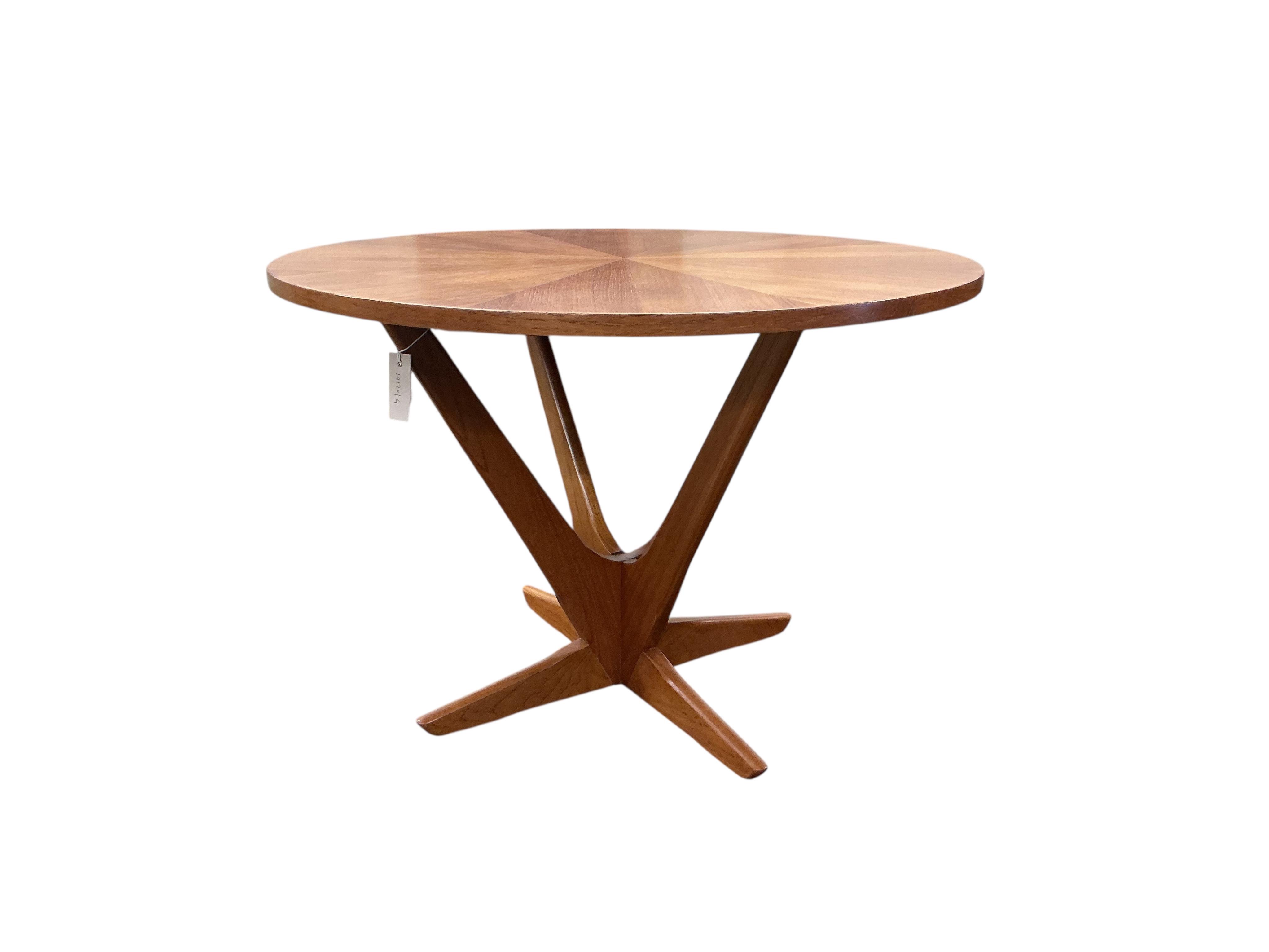 A mid century Danish teak coffee table by Georg Jensen for Kubus, diameter 78cm, height 55cm